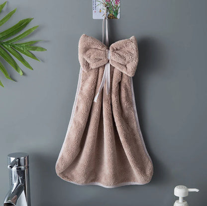 Soft, absorbent coral velvet hand towels with a unique bow design, perfect for Kiwi homes