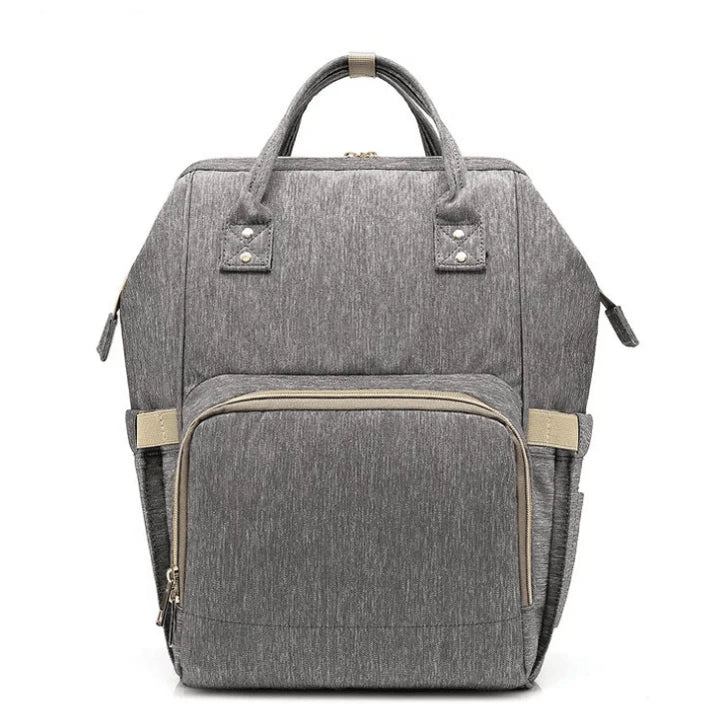 Stylish and practical mummy bag with reinforced handles, durable buckles, and separate bottling area for Kiwi mums