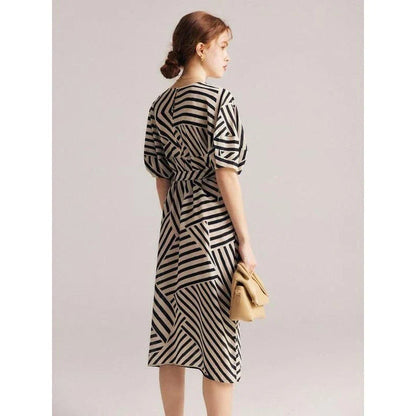 Elegant striped dress made from luxurious Mulberry silk with batwing sleeves, perfect for Kiwi women's fashion.