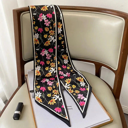 Elegant floral print scarf in soft, cotton-like polyester fabric - a versatile Kiwi accessory for year-round style