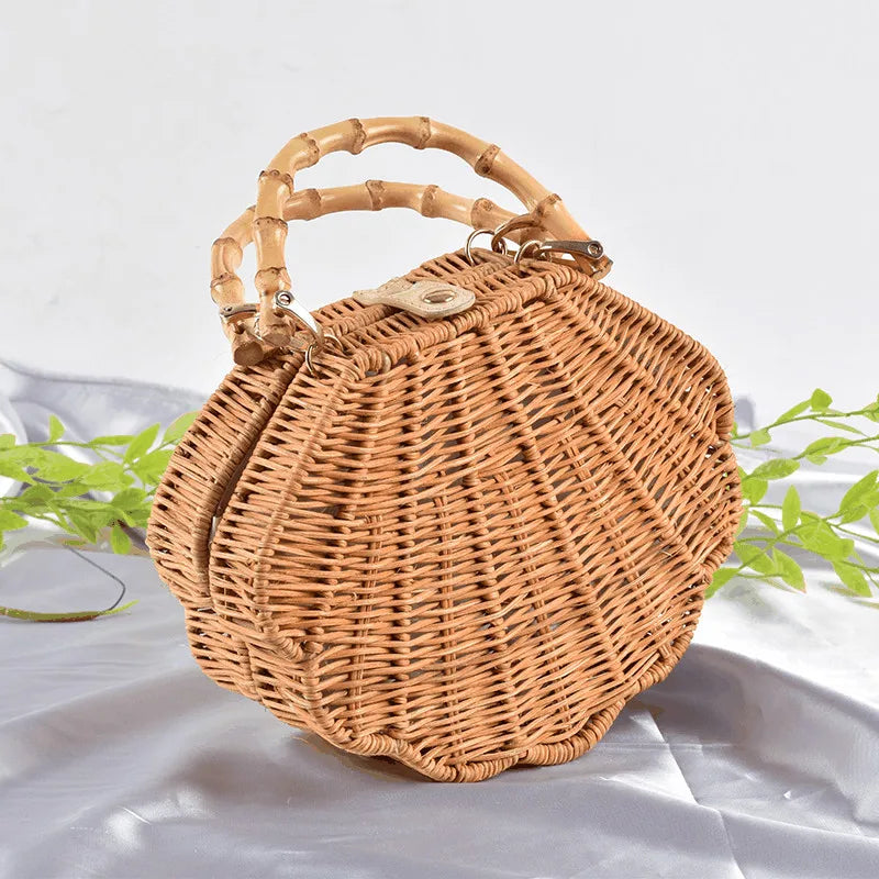 Rattan straw bag with intricate three-dimensional conch shell design, ideal for everyday use and a touch of coastal chic