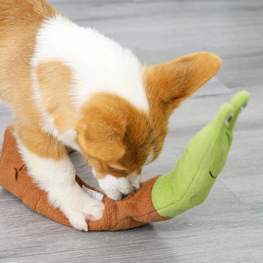 Soft, plush snail-shaped snuffle mat toy for dogs, with multiple treat-hiding pockets and a built-in sound generator for added engagement and mental stimulation.