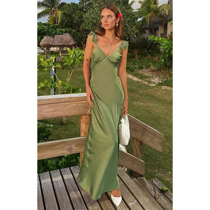 Elegant sleeveless ruffle maxi dress with backless design, perfect for formal events and parties