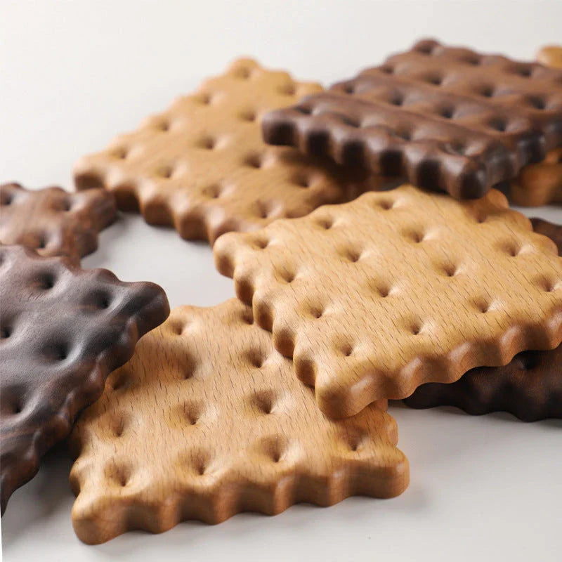 Natural wooden cookie-shaped coasters in beige and brown, handcrafted in New Zealand from premium solid wood