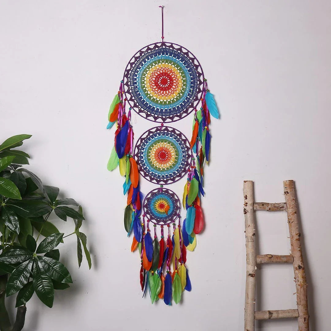 Vibrant, handcrafted dreamcatcher wall hanging with feathers, wood, and beads, adding a touch of Kiwi-inspired charm to any home.