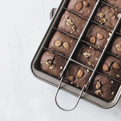 A heavy-duty steel brownie baking pan with a non-stick Teflon coating, perfect for creating delicious homemade treats in any Kiwi kitchen.