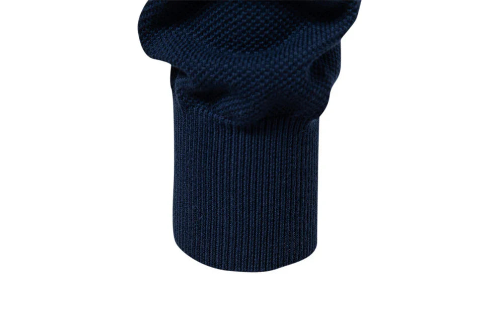 A stylish, slim-fit sweater in a modern colour-blocking design of Lake Green, White, and Grey, made with premium cotton for exceptional comfort and New Zealand casual style.