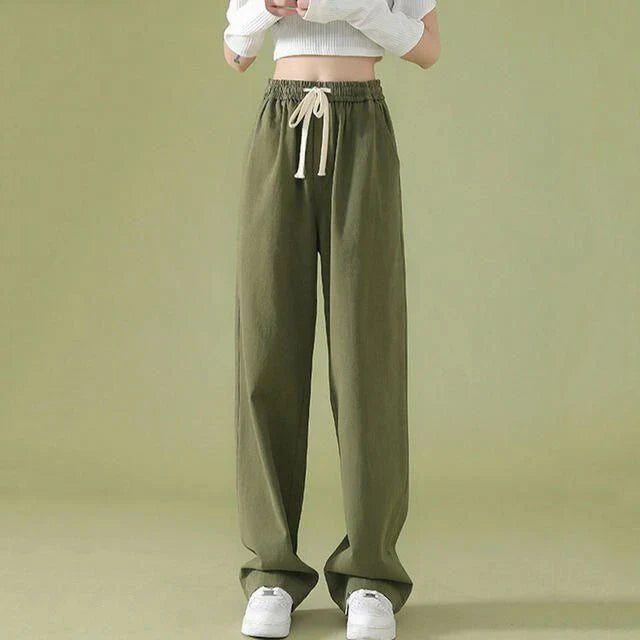 Elegant high waist wide leg pants in a versatile white color, perfect for the modern Kiwi woman's wardrobe.