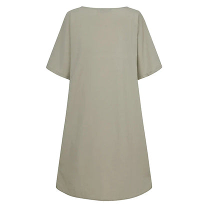 A cotton and linen dress with a round neckline, pockets, and an A-line silhouette in various colors.