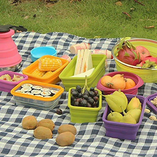 Folding silicone food storage containers in various sizes and colors, perfect for Kiwi kitchens