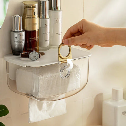 A modern, grey wall-mounted tissue dispenser with a sleek, stylish design to keep tissues and face towels organised in the bathroom or kitchen.