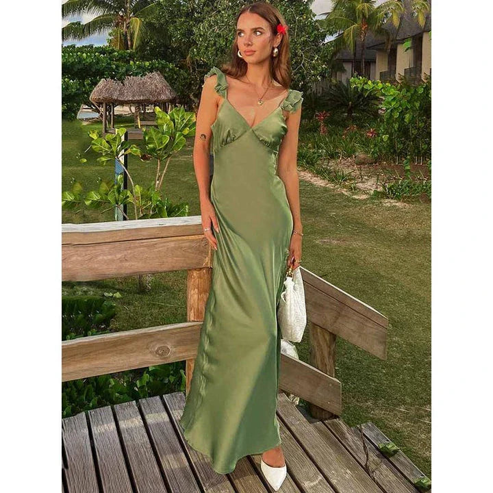 Elegant sleeveless ruffle maxi dress with backless design, perfect for formal events and parties