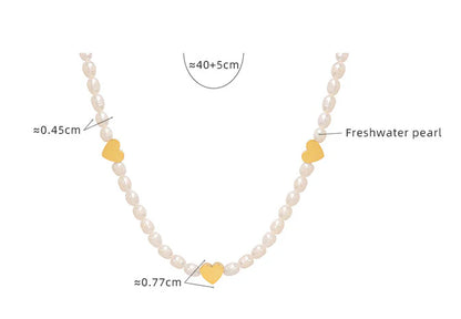 Peach Heart Freshwater Pearl Necklace with a delicate heart design and shimmering pearls, made of durable titanium steel for long-lasting wear