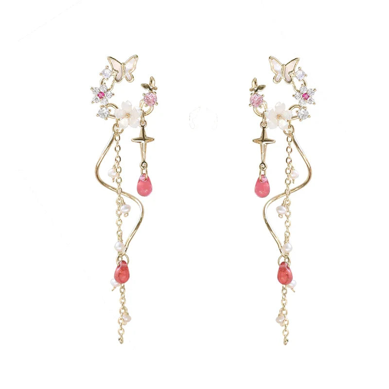 Elegant sterling silver and gold-plated earrings adorned with iridescent freshwater pearls