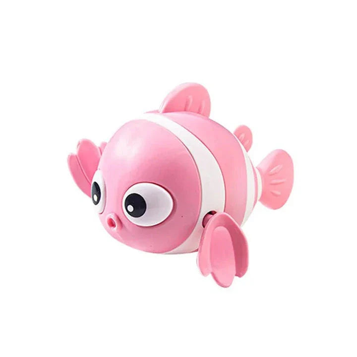 Cartoon fish wind-up bath toy in green, designed for New Zealand toddlers to enjoy during bathtime