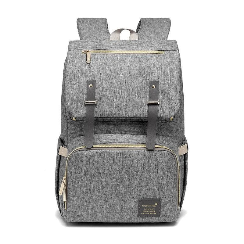 Versatile Mummy Daddy Backpack in Grey, a functional and stylish nappy bag for Kiwi families with a spacious main compartment, insulated pockets, and a USB charging port.