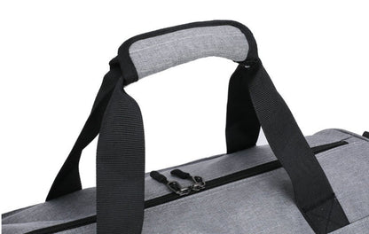 Versatile fitness bag with dry and wet compartments in classic Kiwi colours - red, blue, black, and dark grey