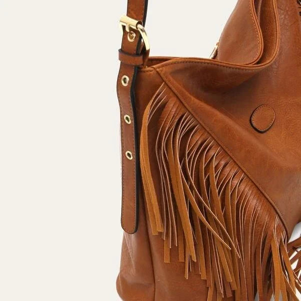 Elegant vegan leather shoulder bag with stylish tassel fringe in black color