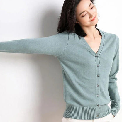 Stylish v-neck cardigan in various colors, featuring a flattering design and luxurious cashmere-rich composition for the modern Kiwi woman