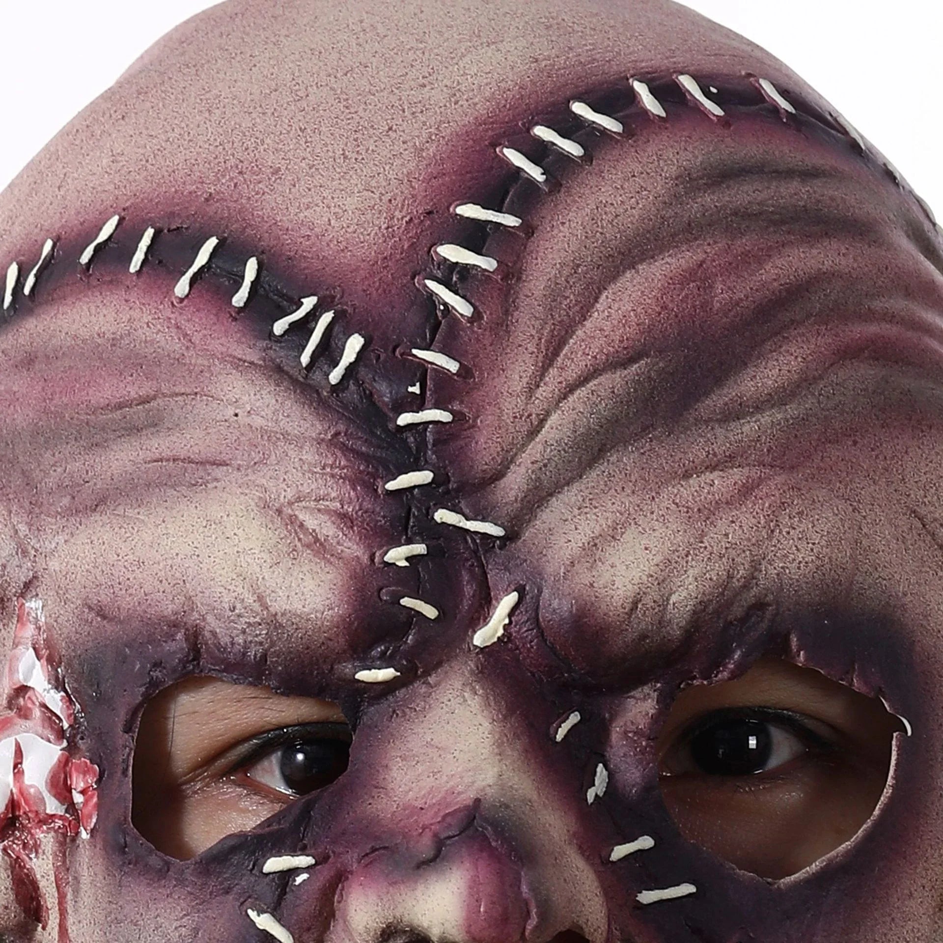 A realistic three-sided horror mask crafted from 100% natural latex, perfect for Kiwi Halloween and costume parties.