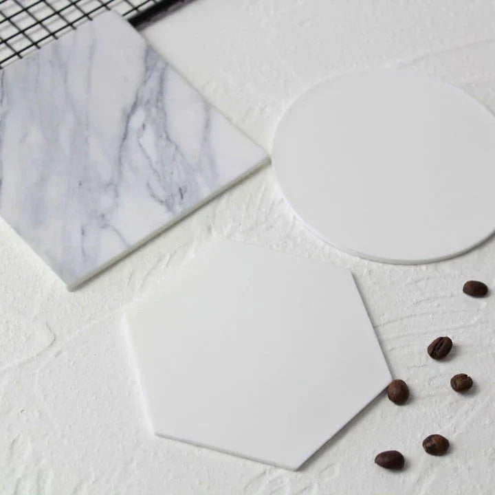 Stylish and practical marble-inspired silicone coasters for protecting surfaces in New Zealand homes