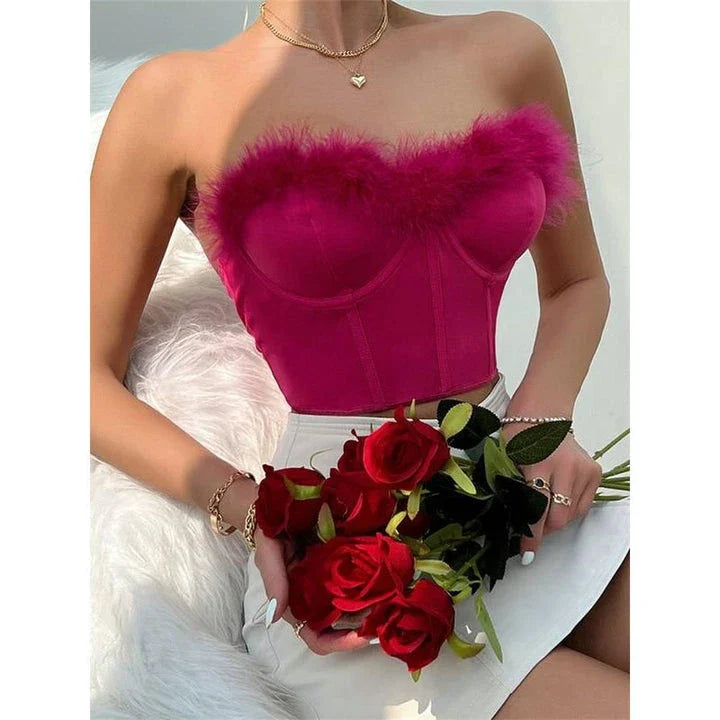 A stylish furry trim corset top in a flattering fit, perfect for adding a touch of glamour to any outfit.