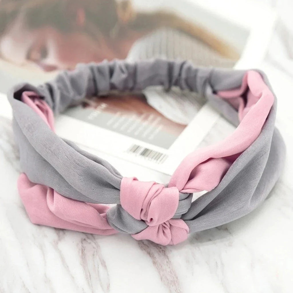 Stylish cross bow patchwork headband in multiple colours, designed for comfortable and fashionable wear