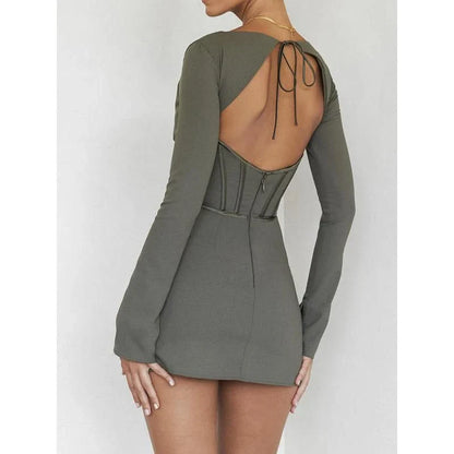 Stylish backless mini dress in green, featuring full sleeves and a flattering fit for the modern Kiwi woman