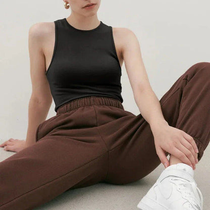 Stylish summer bodycon tank top for Kiwi women, featuring a comfortable and flattering design in a classic beige color.