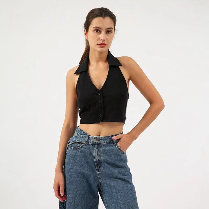 Stylish cotton-polyester cropped halter top in black, featuring a sleek, body-hugging fit and elegant button detail for a chic summer look.