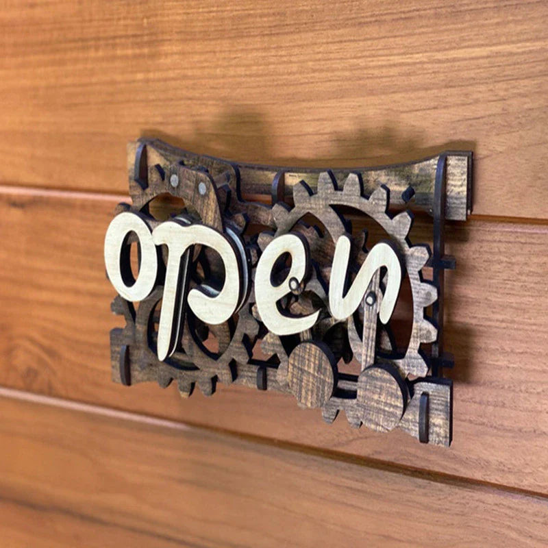 Charming open/closed sign with manual gear mechanism, made of New Zealand pine wood with Kiwiana-inspired design