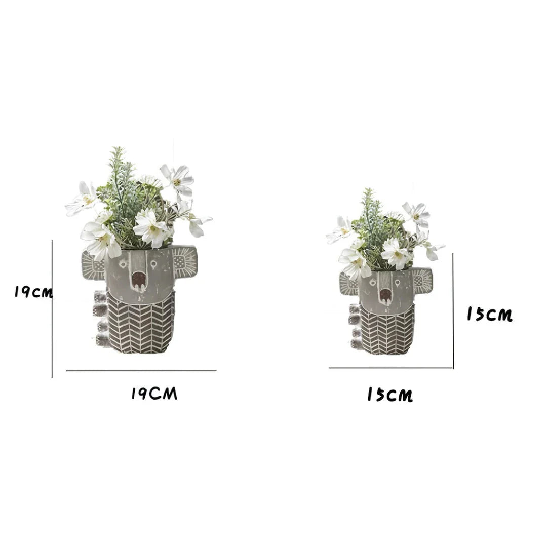 Charming kiwi-inspired koala-shaped cement planter for displaying succulents, small flowers, or as a decorative piece