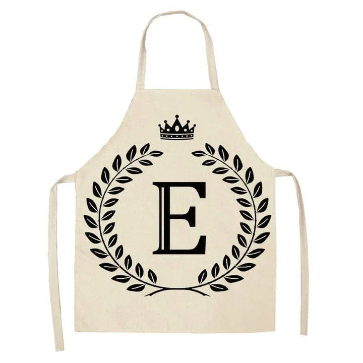 A crown and letter printed kitchen apron made of high-quality cotton and linen, suitable for both men and women in New Zealand kitchens.
