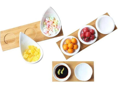 Stylish ceramic snack trays with natural wood pallet, perfect for serving nibbles and entertaining in Kiwi-style homes