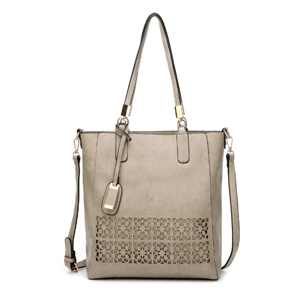 Stylish hollow handbag with adjustable straps, multiple interior pockets, and a durable PU leather construction