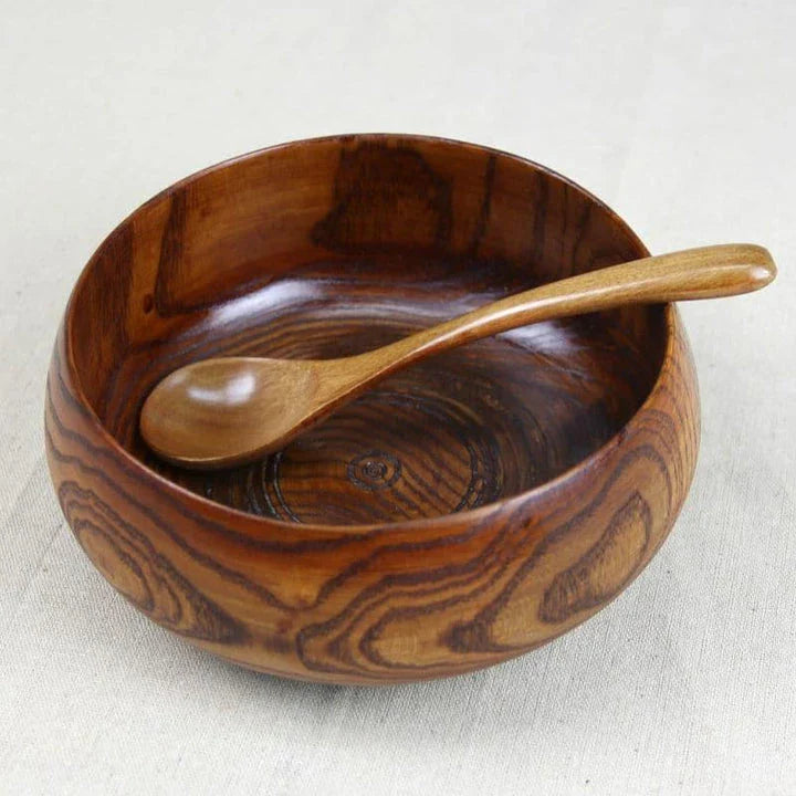 A large, round wooden soup bowl with a warm, natural brown color, perfect for serving hearty meals in Kiwi kitchens.