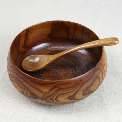 A large, round wooden soup bowl with a warm, natural brown color, perfect for serving hearty meals in Kiwi kitchens.