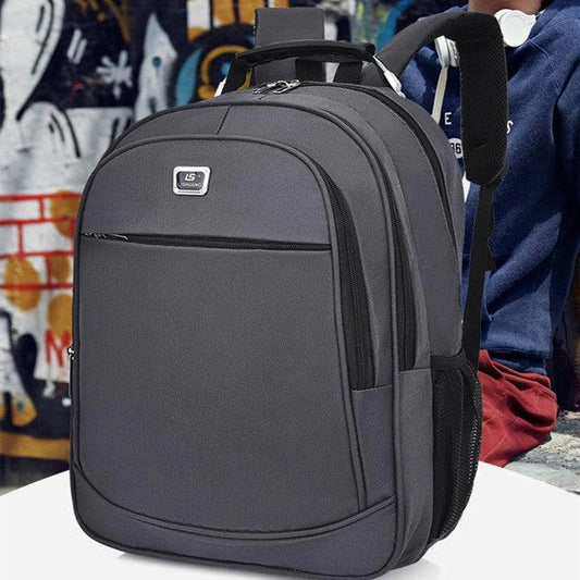 Spacious USB backpack with Oxford cloth and polyester construction, suitable for school, travel, and outdoor adventures