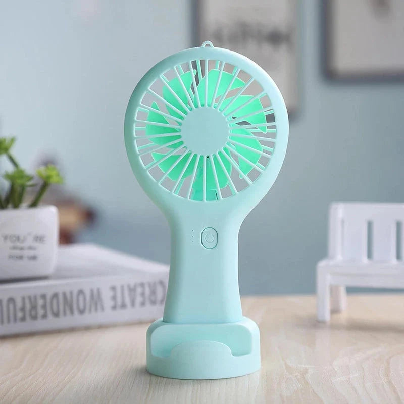 Compact 800mAh Rechargeable Portable Hand Fan in blue colour, perfect for staying cool in the New Zealand summer heat.