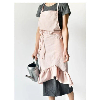 A nordic-inspired linen pleated apron with an adjustable design, perfect for baristas and home chefs in New Zealand.