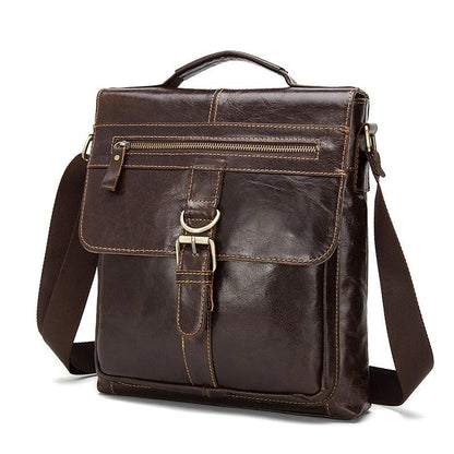 Vintage one-shoulder leather satchel made with premium New Zealand cowhide, featuring a sleek square design, multiple interior pockets, and a comfortable single strap for hands-free convenience.