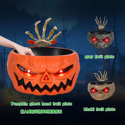 A glowing, pumpkin-shaped plastic plate with ghostly sound effects for Halloween decor and celebrations