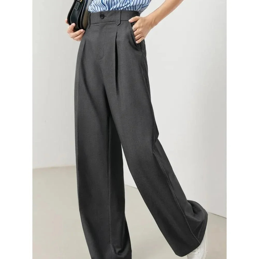 Versatile high-waist wide-leg grey trousers for Kiwi women, offering a chic and comfortable design.