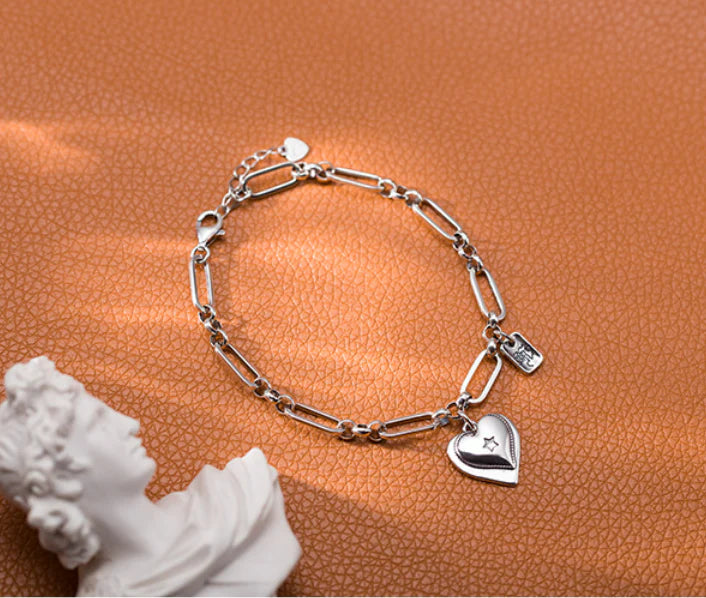 Handcrafted 925 sterling silver bracelet with a delicate heart design, a timeless and elegant accessory for Kiwi women.