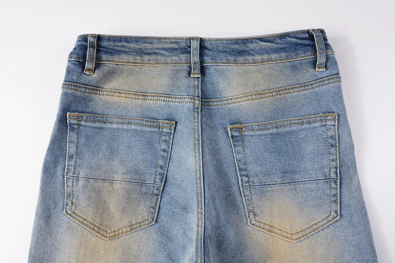 Vintage-inspired jeans with rhinestone and ink splash detailing, perfect for the modern Kiwi lifestyle