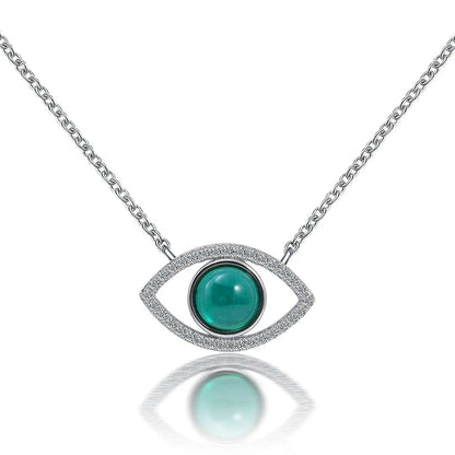 Elegant silver necklace with a captivating cultivated emerald stone, the perfect accessory for Kiwis to elevate their style.