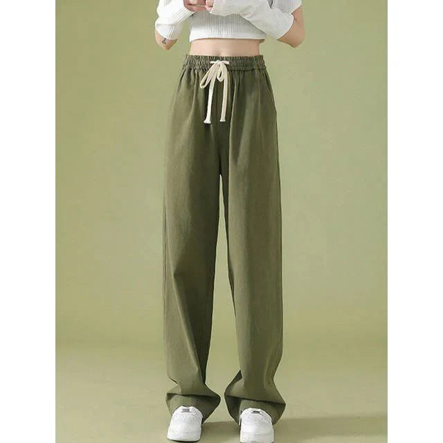 Elegant high waist wide leg pants in a versatile white color, perfect for the modern Kiwi woman's wardrobe.