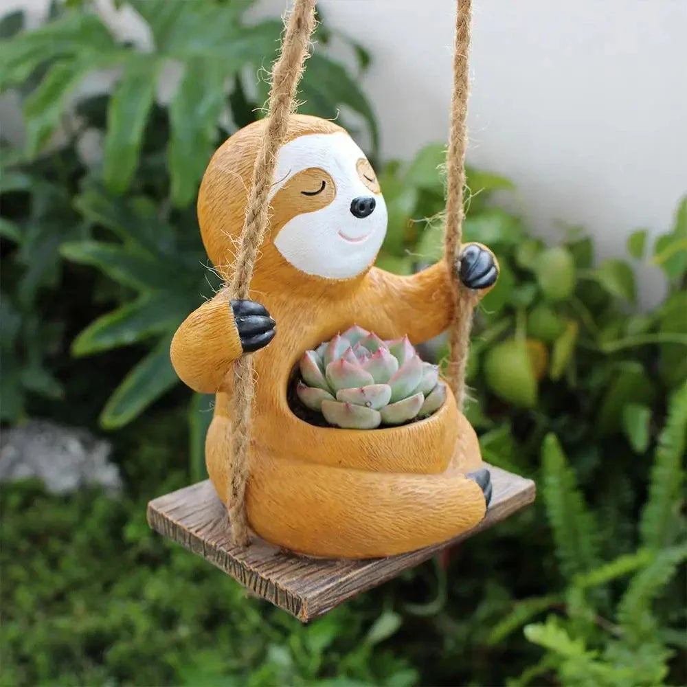 Charming Hanging Sloth Planter in resin material with a vibrant, glossy finish for home and garden decor