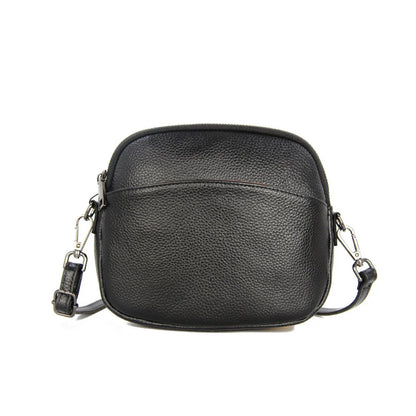 Premium leather messenger bag in black, featuring a spacious interior, adjustable strap, and sleek New Zealand-inspired design.