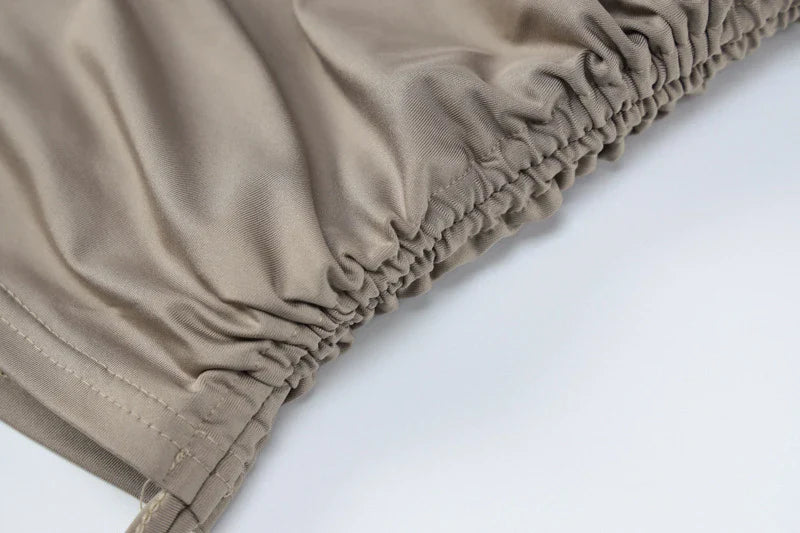 A stylish one-shoulder top and drawstring skirt set made from premium milk silk fabric, perfect for elevating your casual wardrobe.